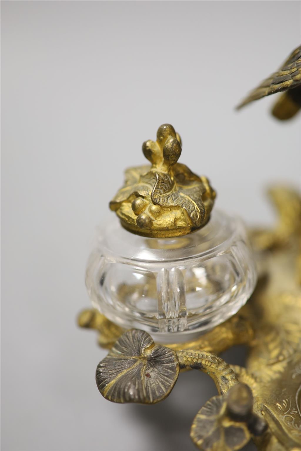 A 19th century French brass gilt metal and mother of pearl crane desk stand, height 13cm